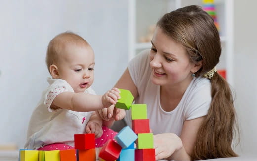 a person holding a baby