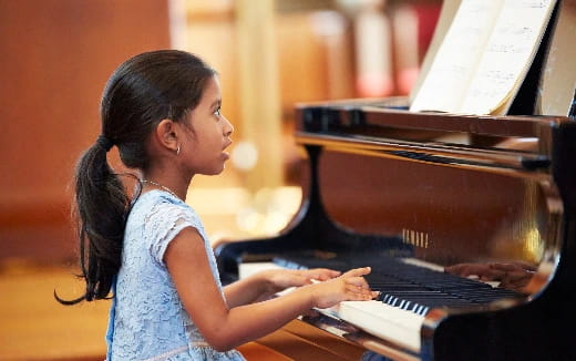 a person playing a piano