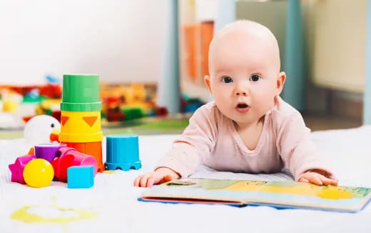 a baby crawling on a table