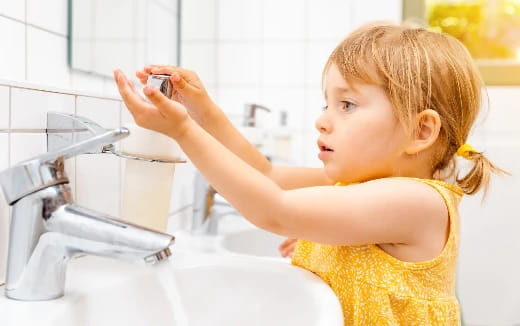 a young girl in a yellow dress