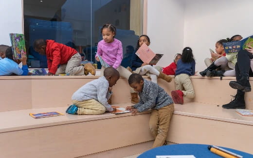 a group of children sitting on the floor
