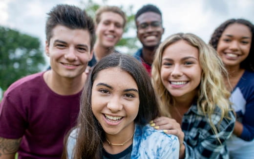 a group of people posing for a photo