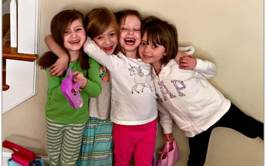 a group of children posing for a photo