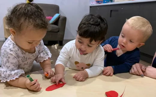 a group of children playing with toys