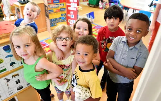 a group of children posing for a photo