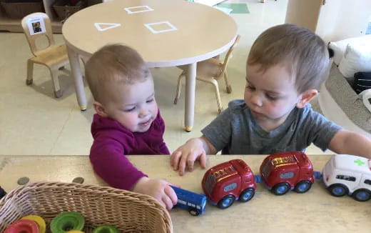 two kids playing with toys