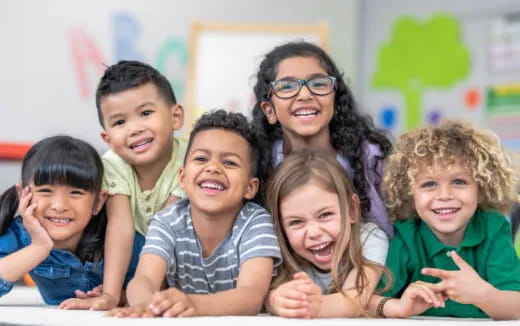a group of children smiling