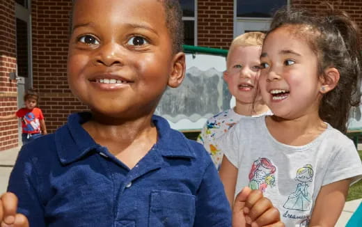a group of children smiling