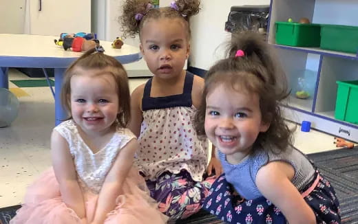 a group of girls smiling