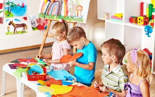 a group of children playing with toys