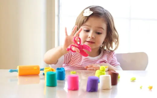 a girl holding a heart