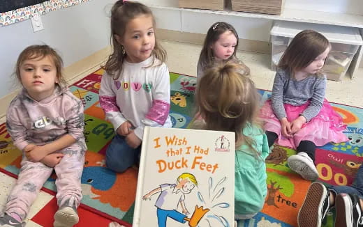 a group of children sitting on a couch