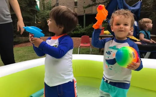 a couple of kids playing with toys