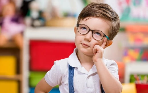 a boy wearing glasses