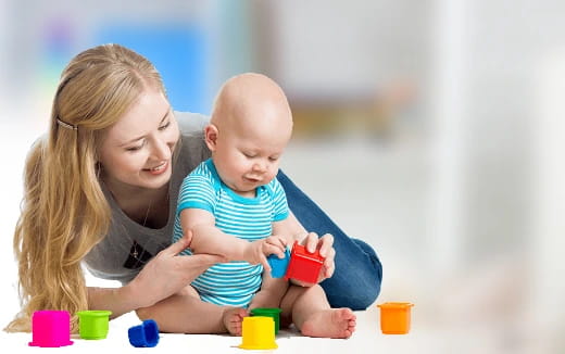 a person holding a baby