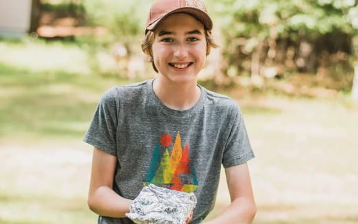 a boy smiling for the camera