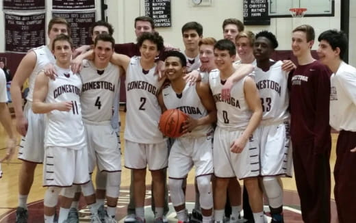 a group of people in white uniforms