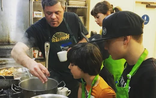 a group of people cooking