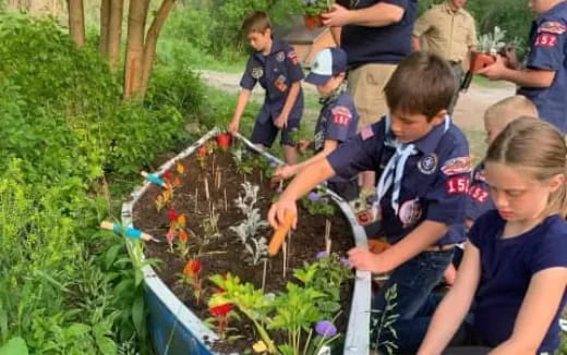 a group of people around a fire