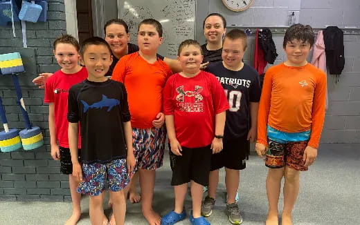 a group of boys posing for a picture