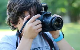 a person holding a camera