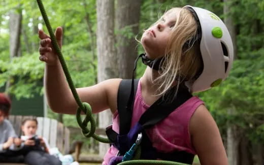 a woman holding a bat