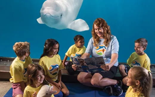 a group of children sitting on the floor