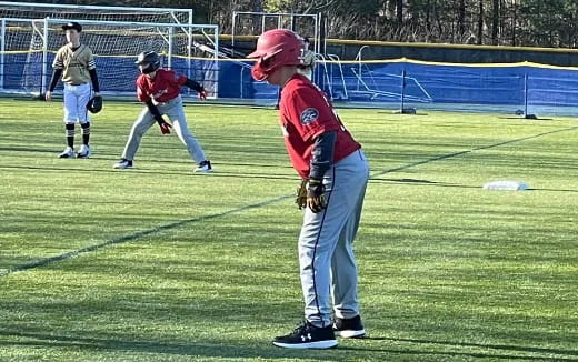 a baseball player prepares to throw a baseball