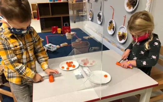 a boy and girl painting