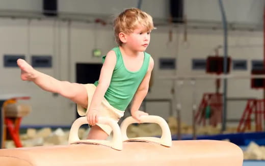 a child sitting on a table