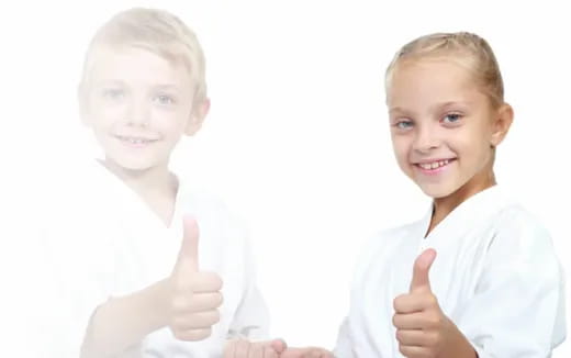 a couple of children smiling