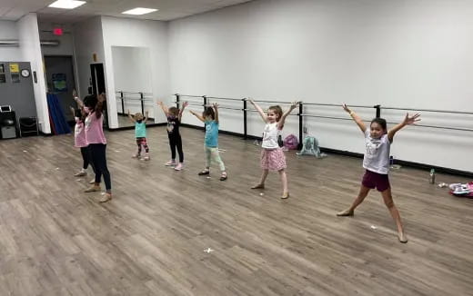 a group of children dancing