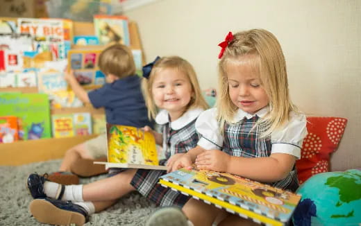 a group of children sitting on the floor