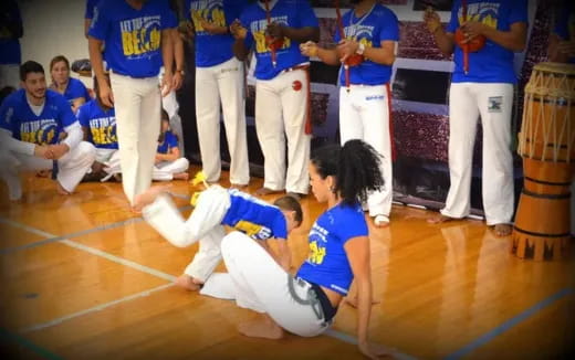 a group of people in a gym