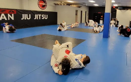 a group of people in a karate class