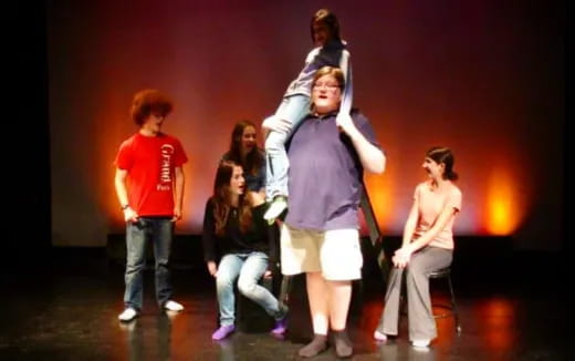 a group of people on a stage