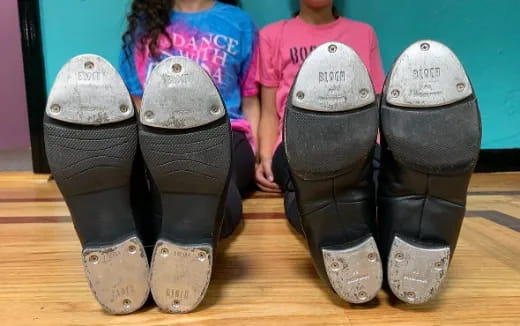 a group of people wearing boots