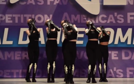 a group of women on a stage