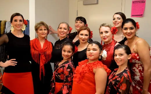a group of women posing for a photo