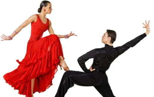 a man and woman dancing