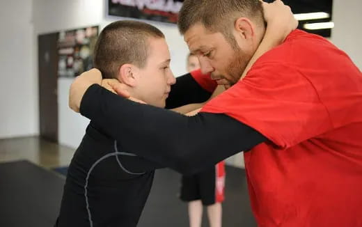 a man holding a child