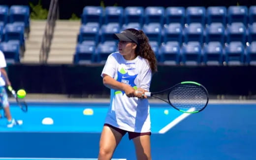 a woman playing tennis
