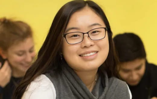 a woman smiling for the camera