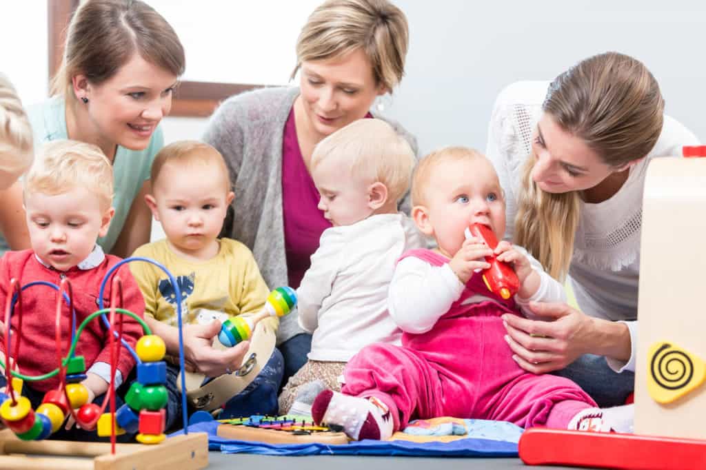 a group of children playing with toys