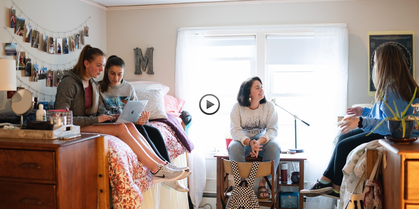 a group of women sitting on a couch